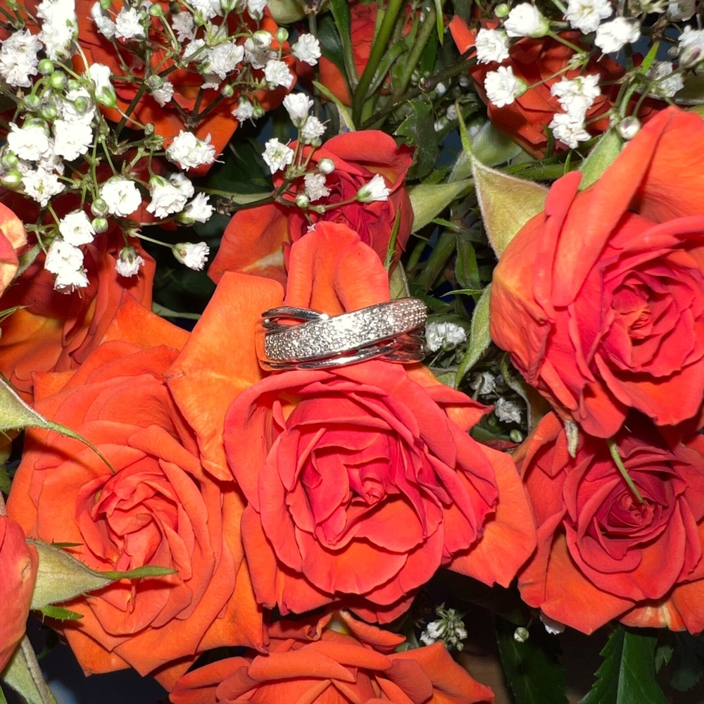 1/10 CT. T.W. Diamond Multi-Row Crossover Anniversary Band in Sterling Silver